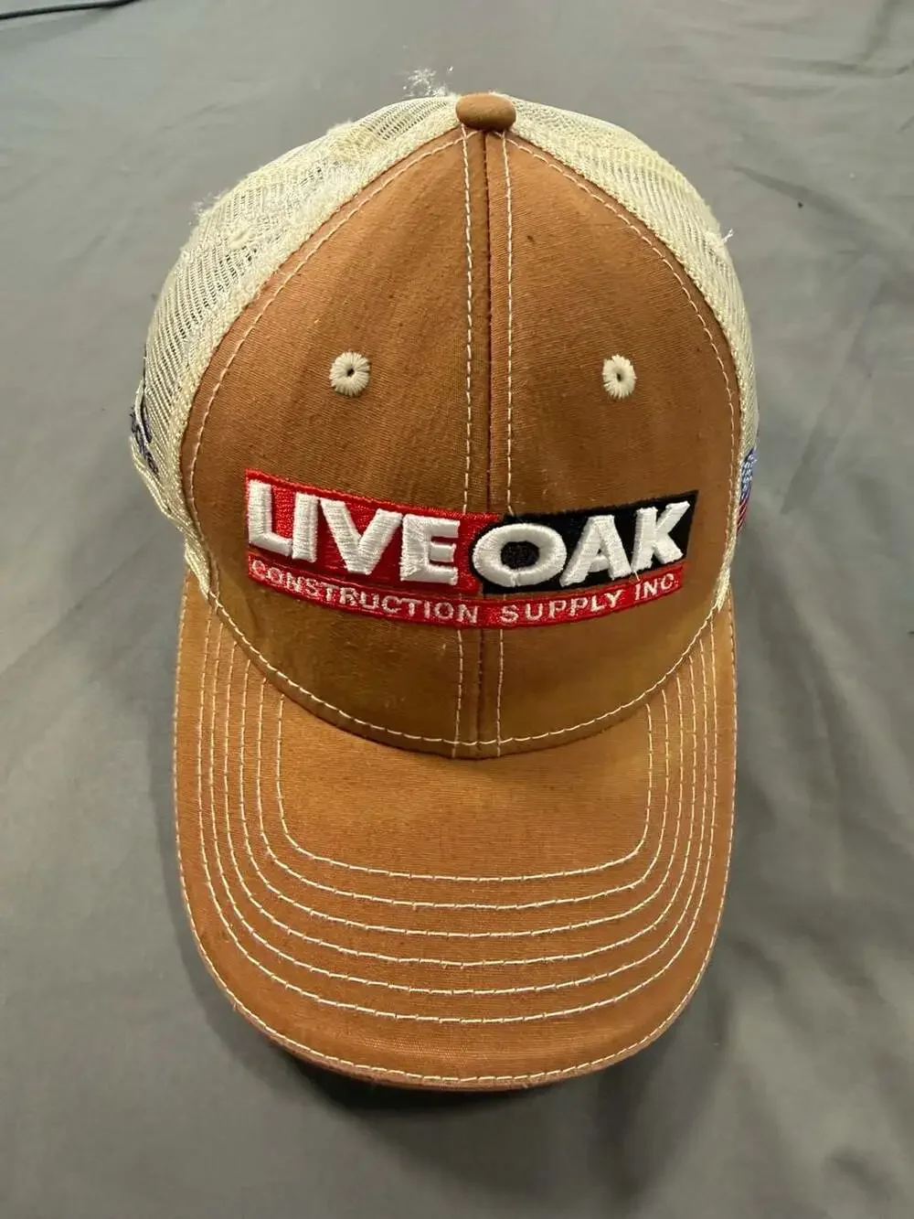 Oak Construction Supply Husqvarna Trucker Hat Brown Tan Snapback Cap